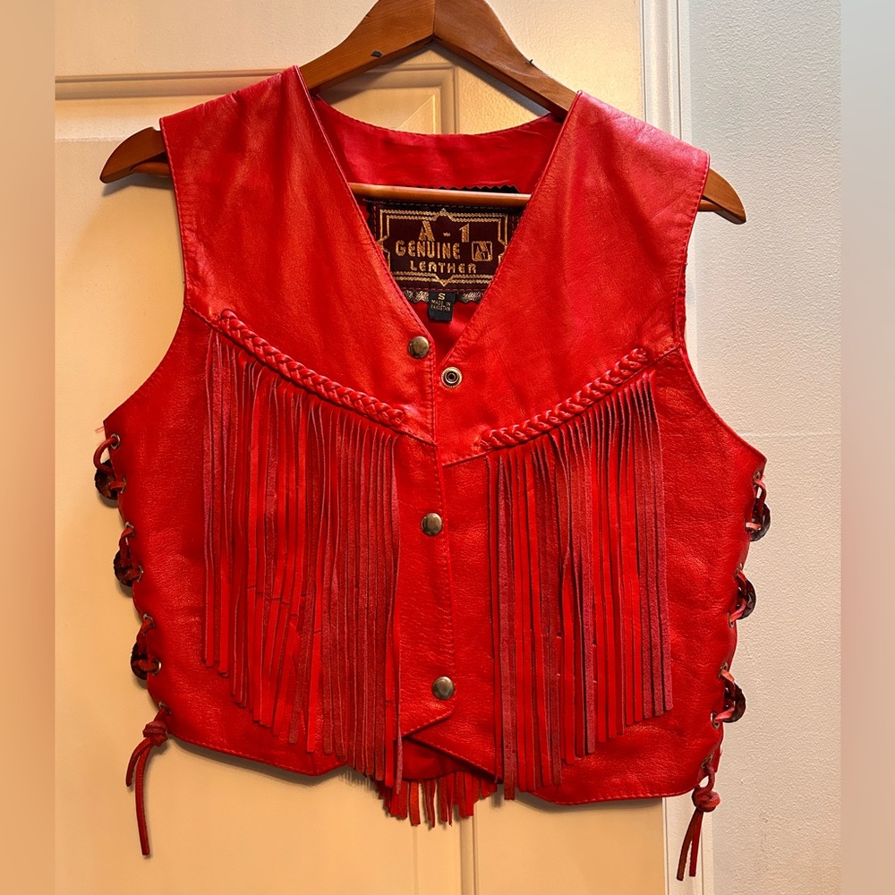 A1 red leather fringe vest, size small.